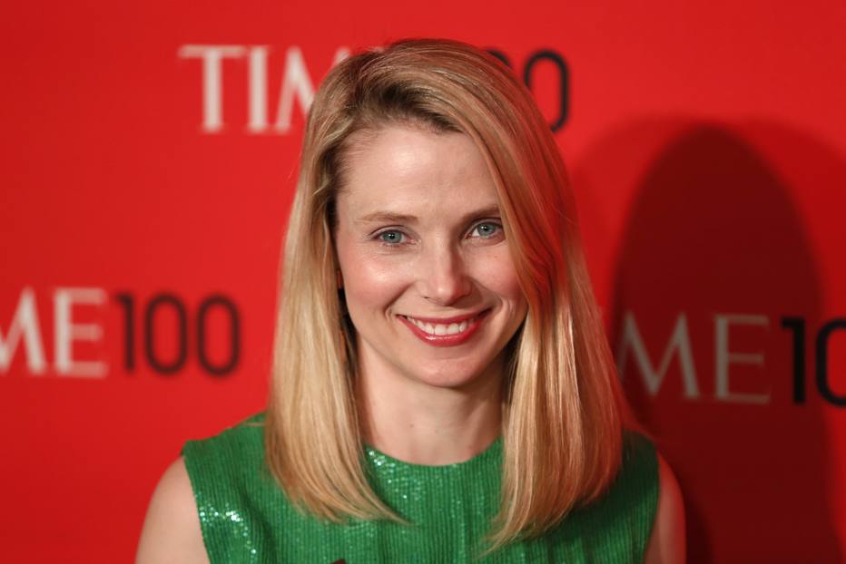 President and CEO of Yahoo, Marissa Mayer, arrives for the Time 100 gala celebrating the magazine's naming of the 100 most influential people in the world for the past year, in New York, in this April 23, 2013 file photo. Yahoo Inc. trimmed its outlook for 2013 revenue on July 16, 2013 after reporting ongoing reductions in display advertising sales volume and prices in the second quarter, signs that CEO Marissa Mayer's effort to revive the struggling Internet giant is not going as rapidly as expected.   REUTERS/Lucas Jackson/Files (UNITED STATES - Tags: ENTERTAINMENT BUSINESS)