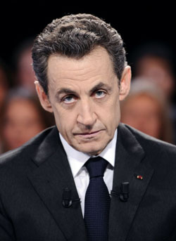 Sarkosy teria recebido dinheiro da herdeira da L'Oréal e do ditador Kadafi (Lionel Bonaventure/AFP)